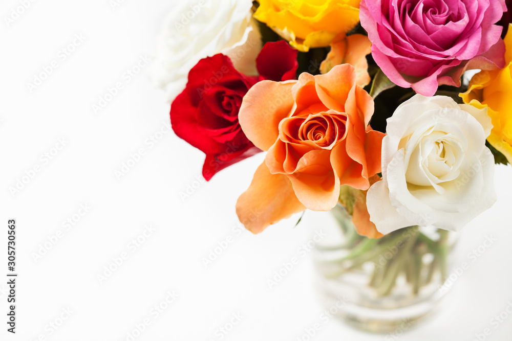 Bouquet of multicolored roses in vase Bouquet of multicolored roses in vase