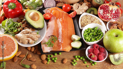 selection of health food with salmon, fruit and vegetable