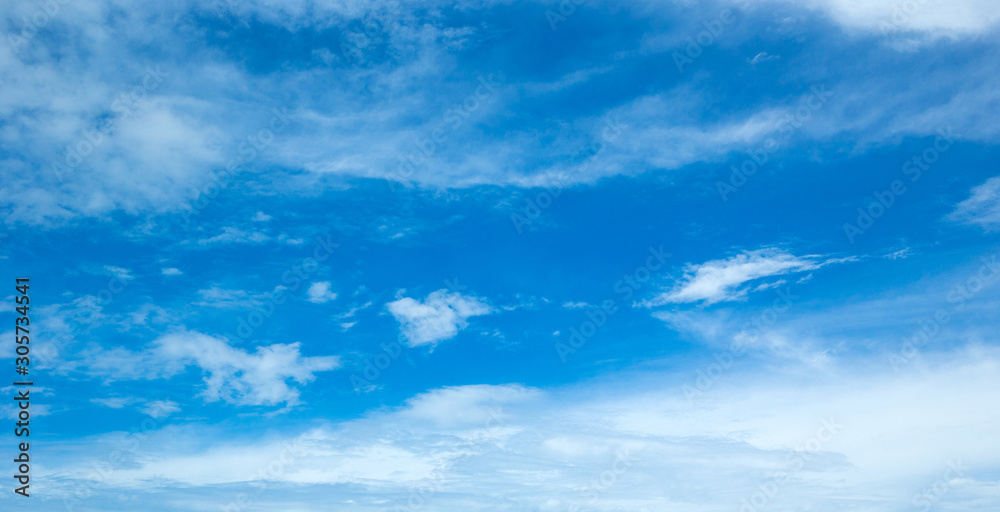 Fototapeta premium blue sky background with tiny clouds