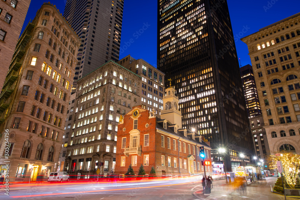 Old State House on historic Freedom Trail at night in blue hour in downtown Boston, Massachusetts, MA, MA, USA. This building was built in 1713 and is the oldest surviving public building in USA.