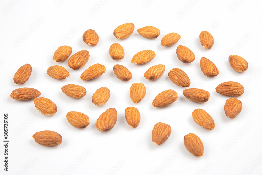 Different nuts on a white background. Vitamin wholesome food. Different nuts on a white background. Vitamin wholesome food.