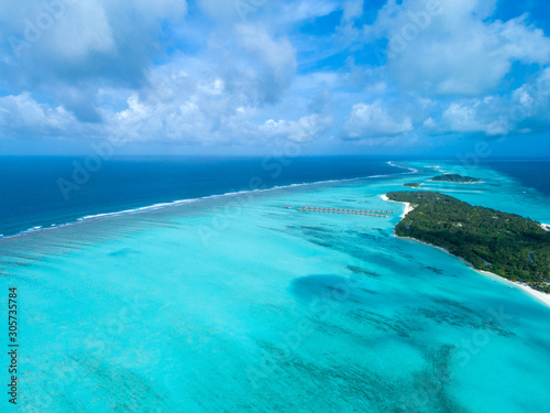 Beautiful aerial view of Maldives and tropical beach . Travel and vacation concept