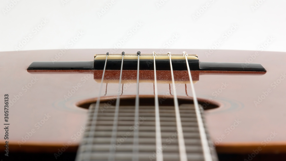 Fototapeta premium fragment of classical guitar closeup. musical instrument