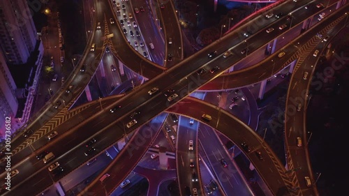 Aerial Video of car traffic and huge elevated road circle multilevel complex, car transportation scene in Shanghai, China in 4K UHD