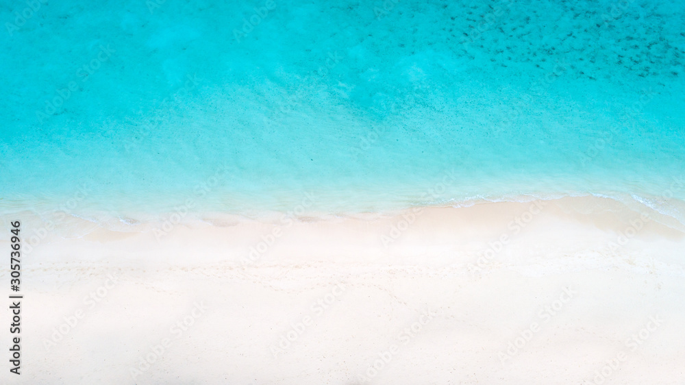 Obraz premium Beautiful aerial view of Maldives and tropical beach . Travel and vacation concept