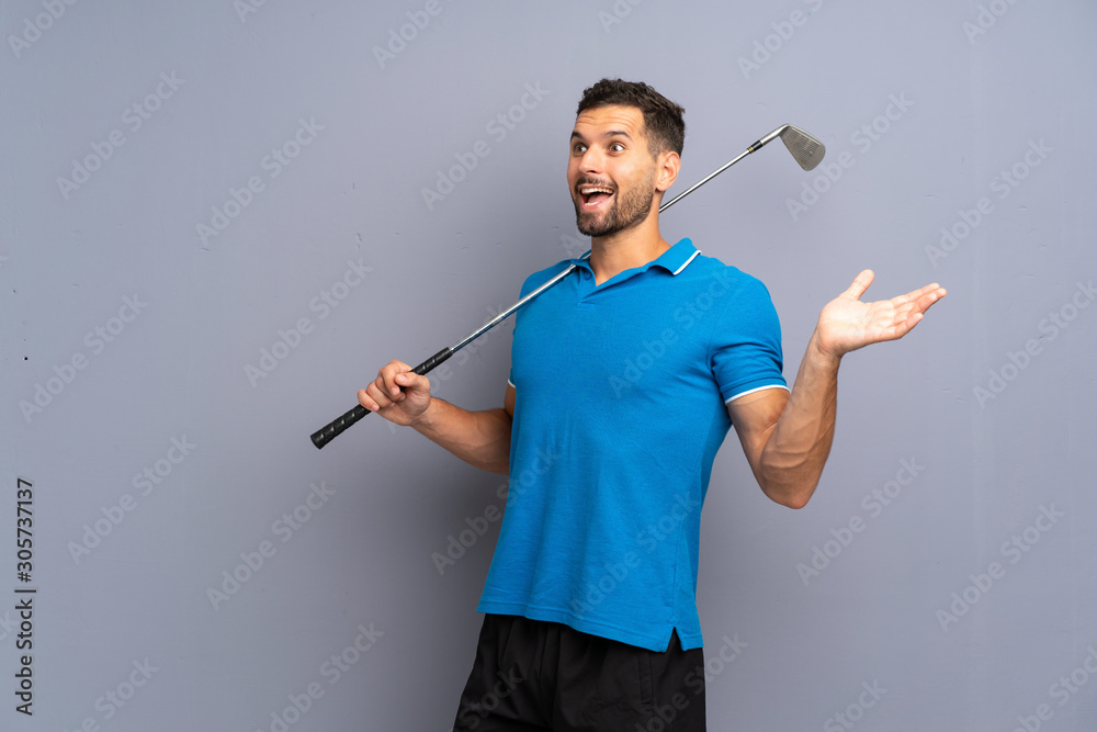 Handsome young man playing golf with surprise facial expression Handsome young man playing golf with surprise facial expression