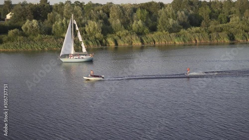 Yacht on the River. Water Skis & Water Skiing Equipment photo