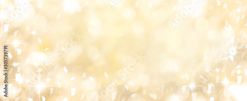 blur elegance yellow color background with glow light and confetti flying spreading with copy space for design on special day such as merry christmas festival , happy new year 2020 celebration, 