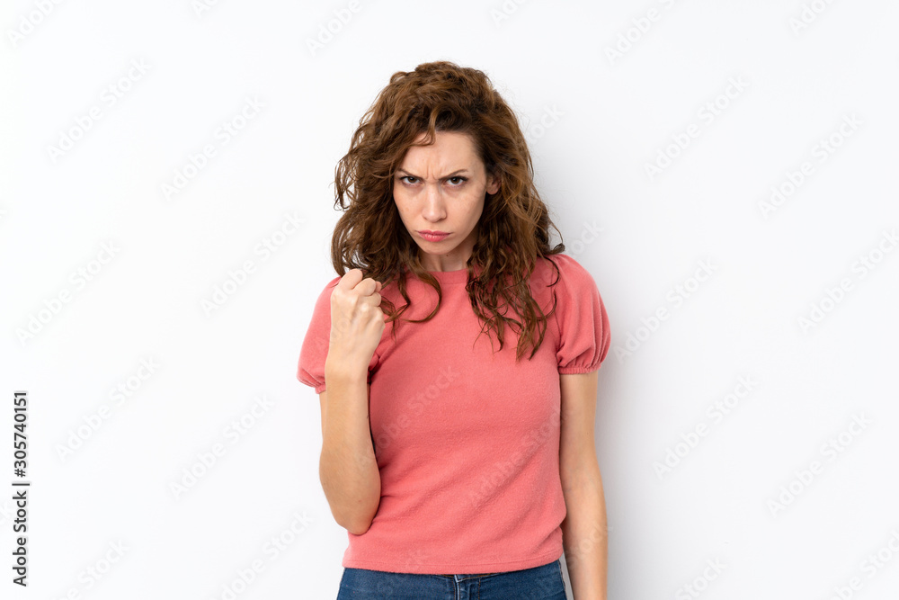 Young pretty woman over isolated background with angry gesture Young pretty woman over isolated background with angry gesture