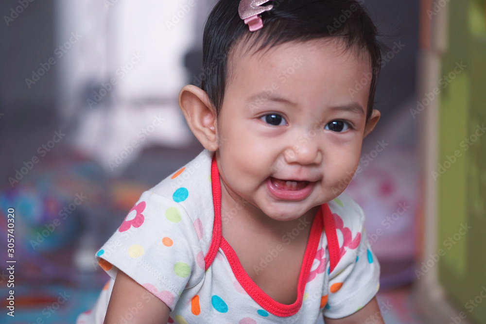 Asian baby girl is smiling Asian baby girl is smiling