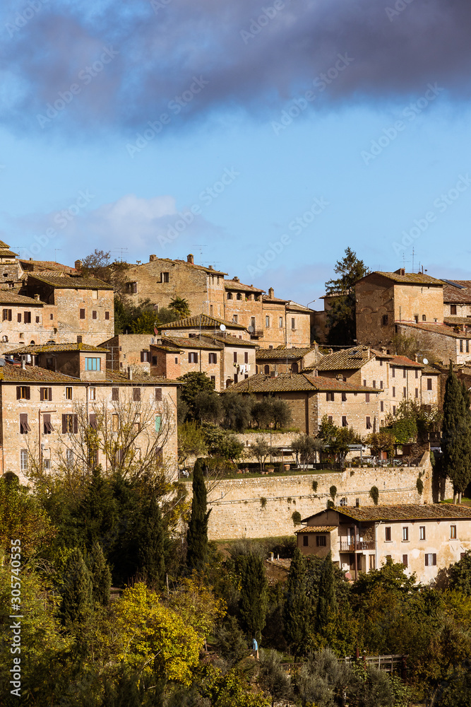Houses of Tuscany in Italy under the blue sky.
