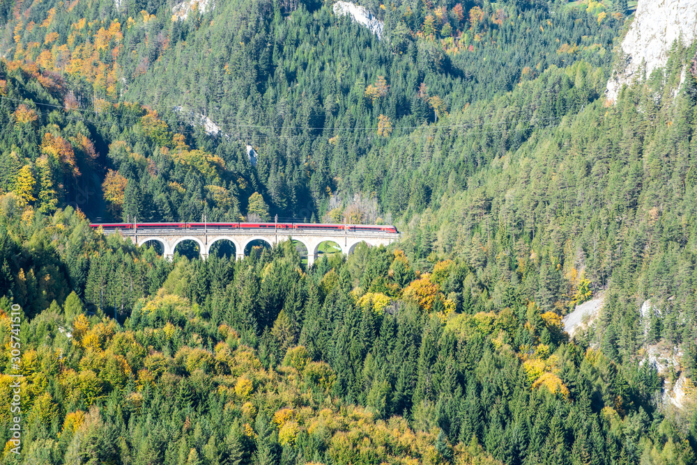 Viaduct and tunnel on the Semmering Railway. The Semmering Railway is the oldest mountain railway of Europe and a Unesco World Heritage site.