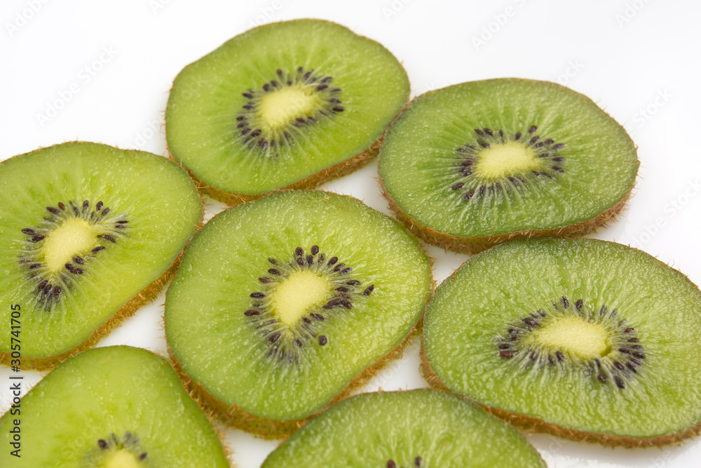 sliced kiwi fruit slices on a white background sliced kiwi fruit slices on a white background