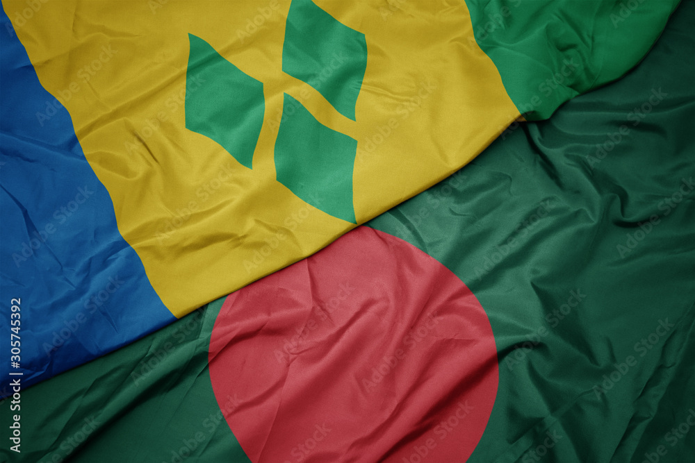 waving colorful flag of bangladesh and national flag of saint vincent and the grenadines. waving colorful flag of bangladesh and national flag of saint vincent and the grenadines.