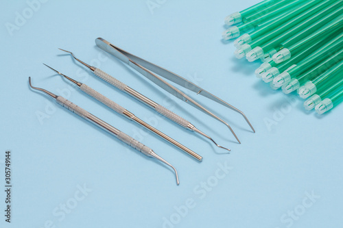 Set of metal dental instruments for teeth dental care