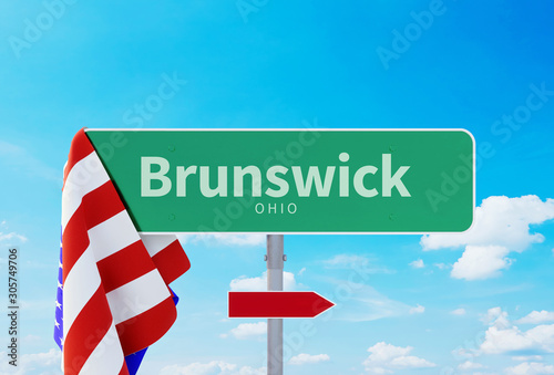 Brunswick – Ohio. Road or Town Sign. Flag of the united states. Blue Sky. Red arrow shows the direction in the city. 3d rendering