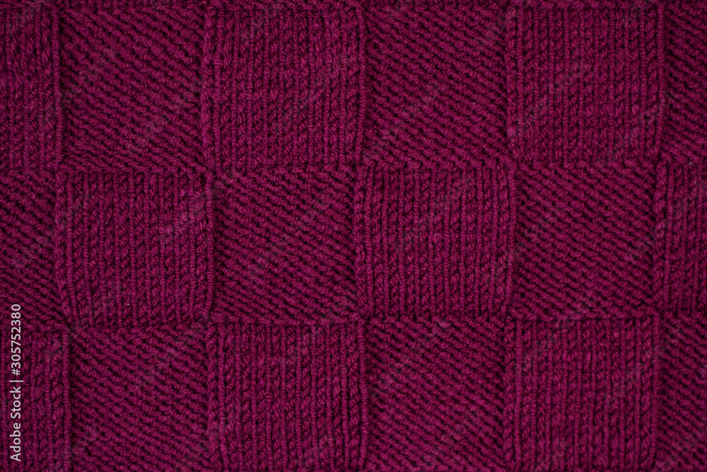 Fototapeta premium Purple plaid knitted. Texture of knitted fabric.
