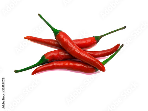 Group oof four Red Hot chili peppers isolated on white background