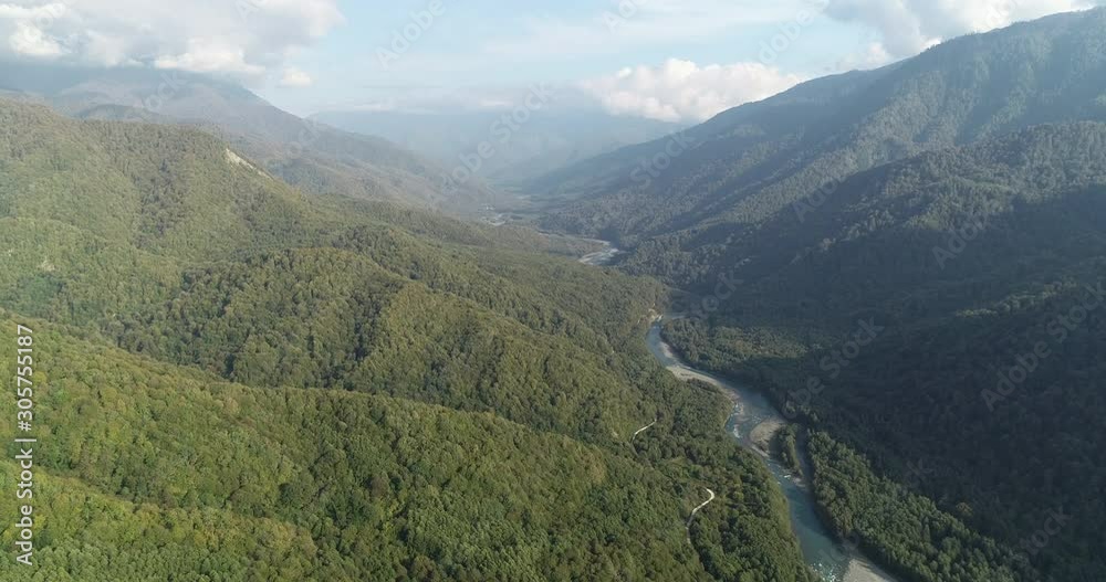 Kodori Gorge in Abkhazia. Autumn nature around the mountain river Kodor in the area of the Bagad rocks. Military Sukhumi road.