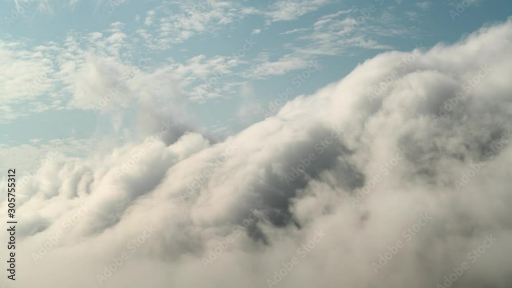 Blue sky with white fluffy clouds. Cloudy heaven nature background. Timelapse video, UHD 4k Blue sky with white fluffy clouds. Cloudy heaven nature background. Timelapse video, UHD 4k