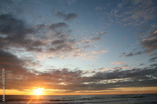 Cloudy sunset at the beach  © Marco Colazingari