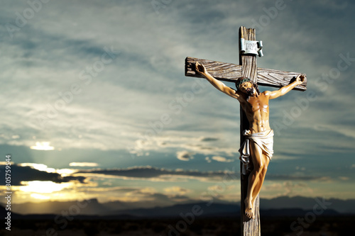 Billede på lærred A small statue of Jesus Christ on the Cross