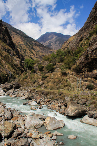 Stunning beautiful views of the nature of the Himalayan mountains in Nepal. The highest pedestrian pass in the world Torong La on a trekking circle around Annapurna. mountain river with clean  water.