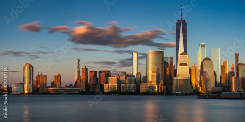 Sunset on the Lower Manhattan skyscrapers of Lower Manhattan  World Trade Center  from the Hudson River. Financial District  New York City  NY  USA