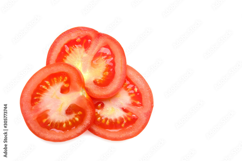 sliced fresh red tomatoes, isolated on a white background. top view sliced fresh red tomatoes, isolated on a white background. top view