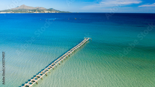 wooden pier in the sea Alcudia Mallorca Spain