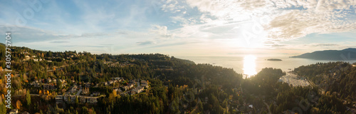 Horseshoe Bay  West Vancouver  British Columbia  Canada. Aerial view of residential homes near the Highway during a bright and sunny sunset in Fall Season.