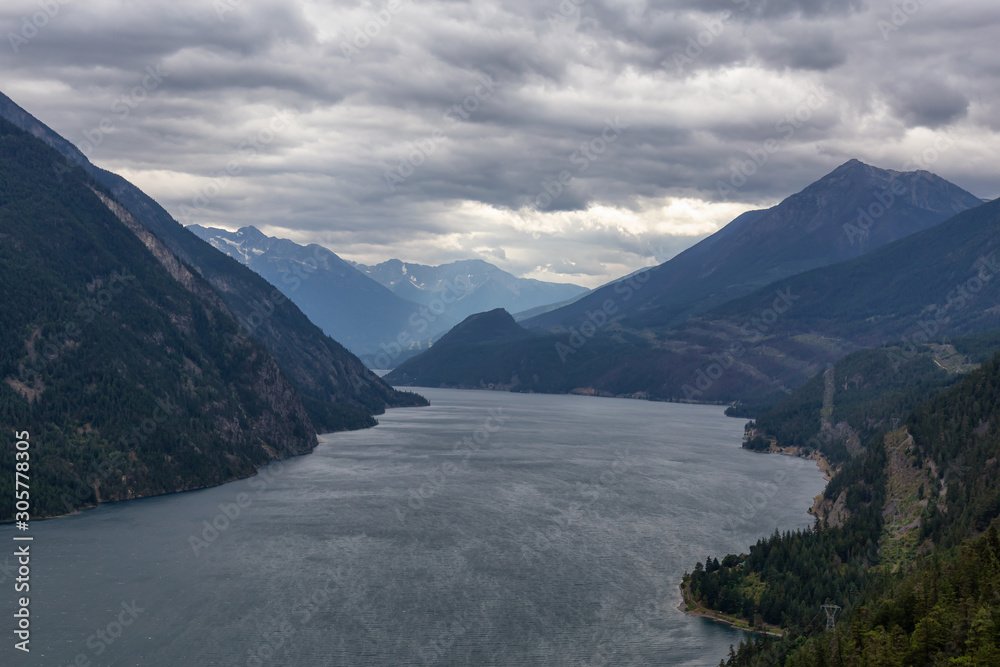 Aerial View of Anderson Lake surrounded by Canadian Mountain Landscape during a cloudy summer day. Located near Lillooet, BC, Canada.