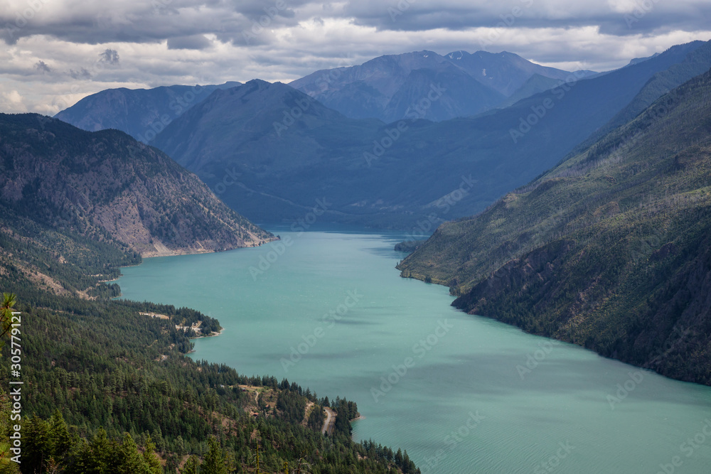 Beautiful View from Above of Seton Lake surrounded by Canadian Mountain Landscape during a summer day. Taken in Shalalth near Lillooet, BC, Canada.