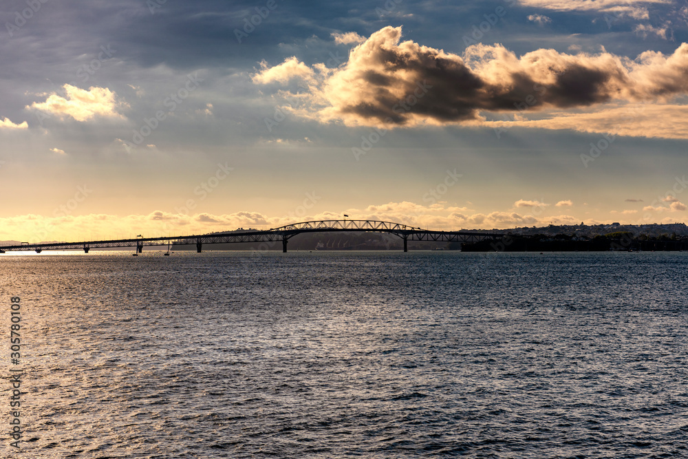 Evening atmosphere in Devenport, with a view of the Harbor Bridge, Auckland, New Zealand