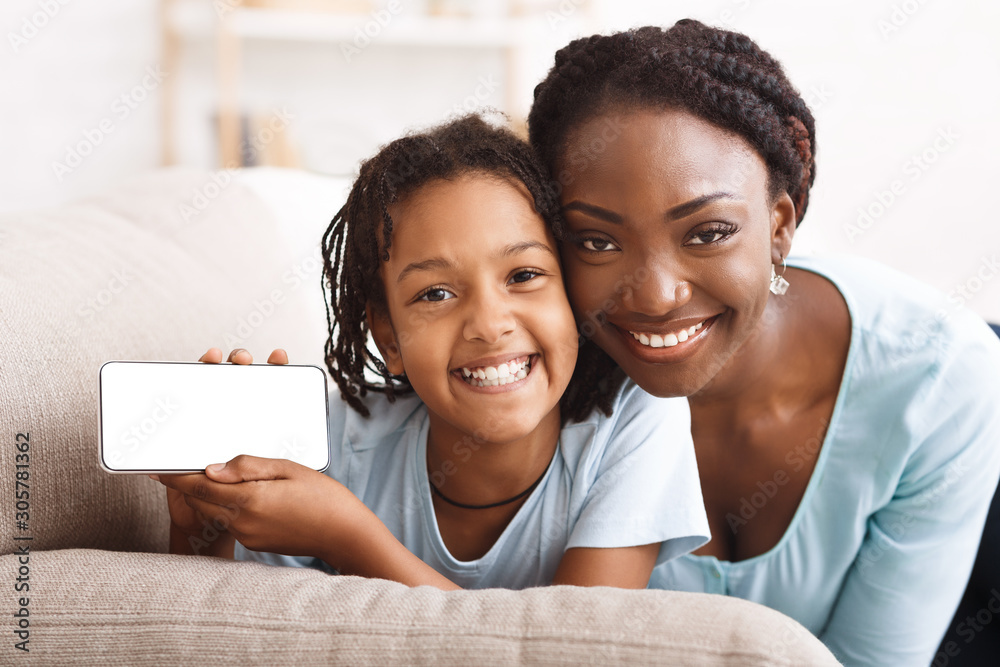 Mockup image of afro family showing mobile phone Mockup image of afro family showing mobile phone