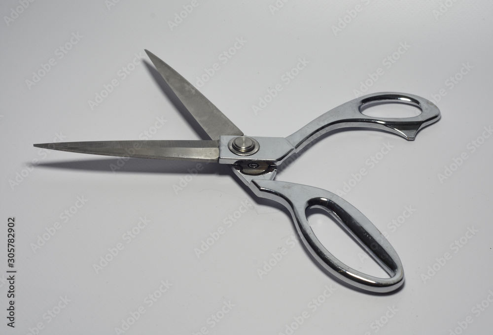 Metal scissors for tailoring on the table Metal scissors for tailoring on the table