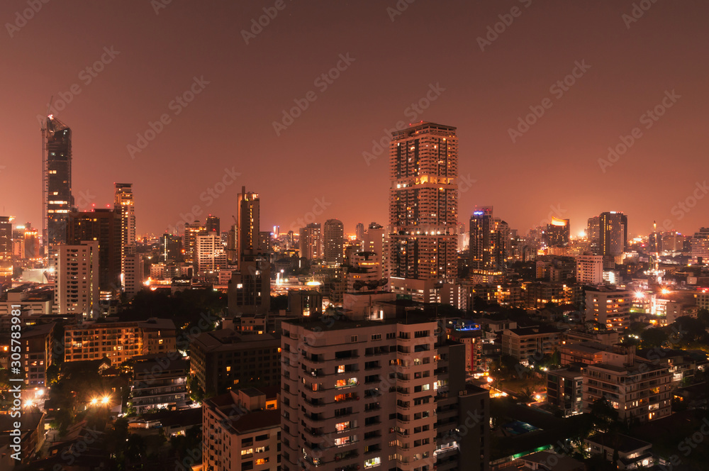 Bangkok night view with skyscraper in business district in Bangkok Thailand