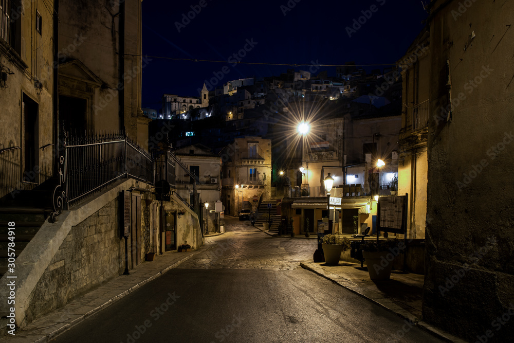 Old street of the ancient baroque town Ragusa Ibla in SIcily, south Italy