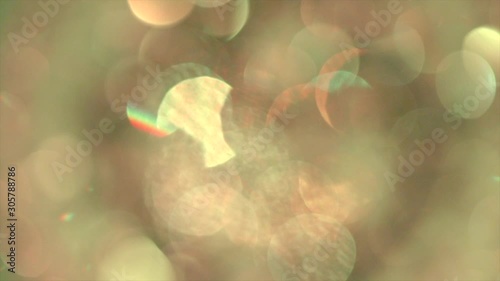 Flickering sparkling background in yellow-green tones. Bokeh.
