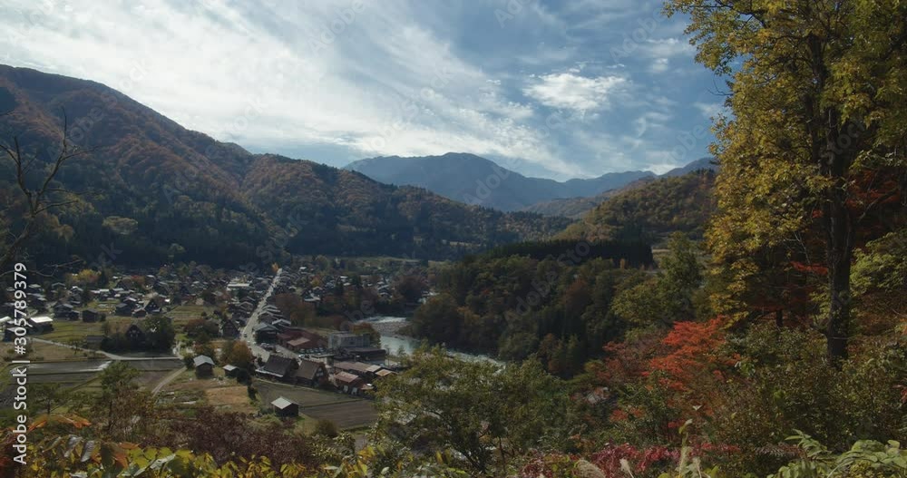 Timelapse view at historic Village of Ogimachi in Shirakawa-gō, UNESCO World Heritage Site, a small, traditional village showcasing a building style known as gasshō-zukuri. Japan. Timelapse view at historic Village of Ogimachi in Shirakawa-gō, UNESCO World Heritage Site, a small, traditional village showcasing a building style known as gasshō-zukuri. Japan.
