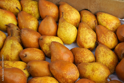 Fresh pears at the market . Healthy food        