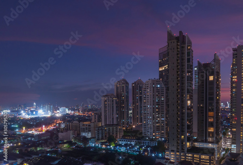 Bangkok night view with skyscraper in business district in Bangkok Thailand © banlai