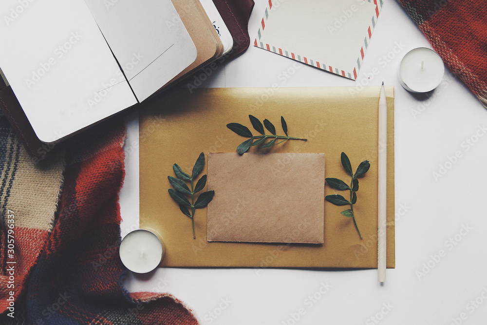 Opened book and leaves, postcard, autumn home comfort