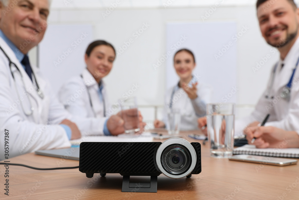 Fototapeta premium Video projector on table during medical conference