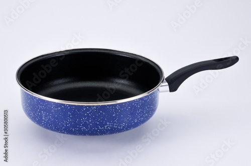 Blue tall pan with black handle on white background