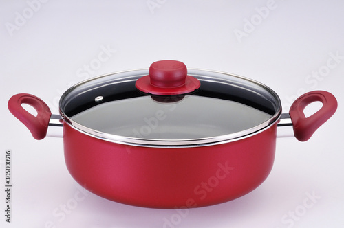 red pot with glass lid