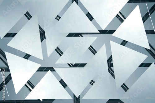 Modern architecture fragment of glass ceiling, roof or wall with frames of transparent panels. Structural glazing with reflections. Abstract geometric background with polygonal pattern.