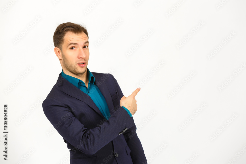 Man standing and presenting something above against white background Man standing and presenting something above against white background