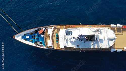 Aerial top down photo of luxury yacht in deep blue Mediterranean sea © aerial-drone