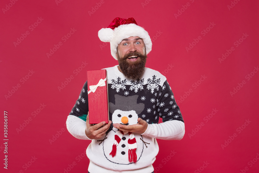 Joyful shopping. Favorite tradition. Happy new year. Christmas gift concept. Man celebrate winter holiday. Hipster in winter sweater. Winter season holidays. Box in his hands. Santa gave me present